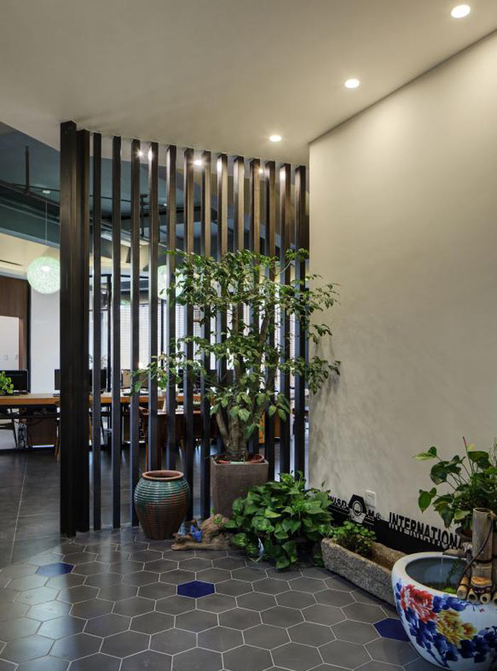 進出口貿易公司辦公室進門區(qū)裝修設計效果圖